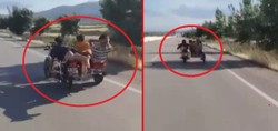 Motosikleti yatarak sürdü! Tehlikeli akrobasi kamerada...