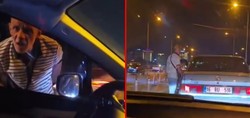 Sinyal vermeyen kadın sürücünün önünü kesip camı yumrukladı!