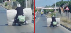 Görenler şaştı kaldı! Motosikletle yatak taşıdı