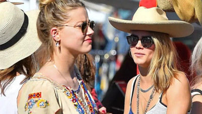 Amber Heard’ün Cara Delevingne ile öpüşme görüntüleri ortaya çıktı