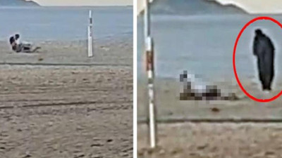 Dünyaca ünlü plajda cinsel ilişki rezaleti. Film izler gibi seyretti. Plajda seks yapan çift çevredekilere aldırış etmedi
