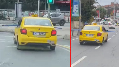 İstanbul'dan bir trafik manzarası. Taksiye koydukları metrelerce uzunluktaki boruyu böyle götürdü, görenlerin ağzı açık kaldı