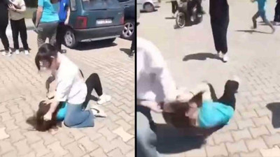 Sivas'tan sonra şimdi de Bursa! Liseli kız, ortaokul öğrencisi kızı saçlarından tutup yerde sürükledi. O anlar kameraya böyle yansıdı